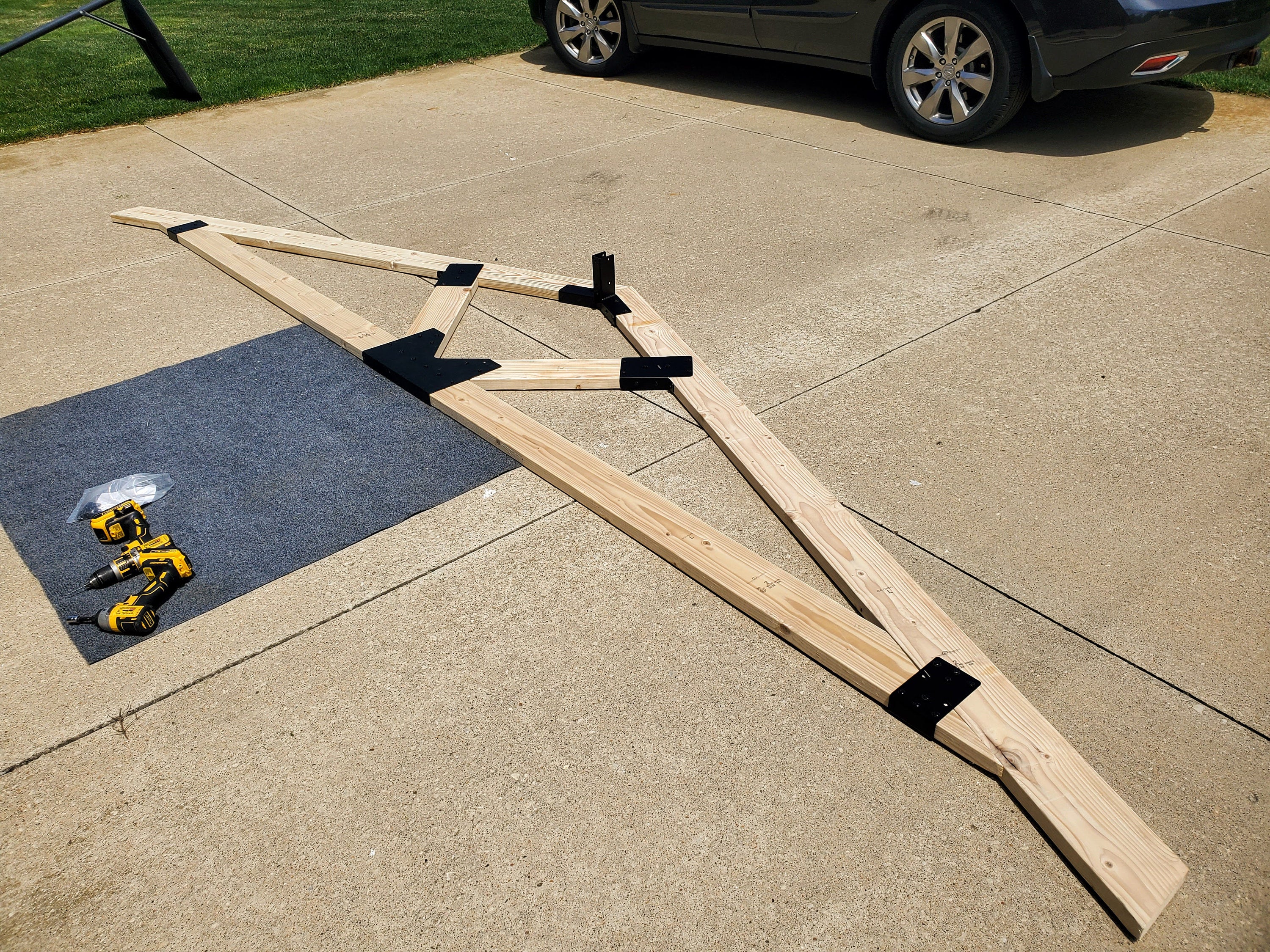 A truss frame on concrete ground