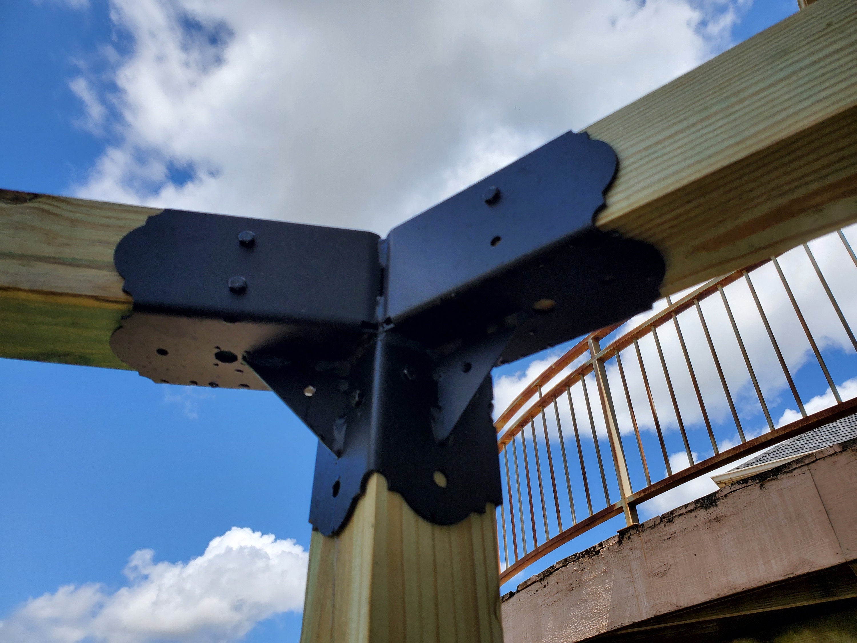 A sturdy metal corner bracket designed for providing structural support in various building projects.