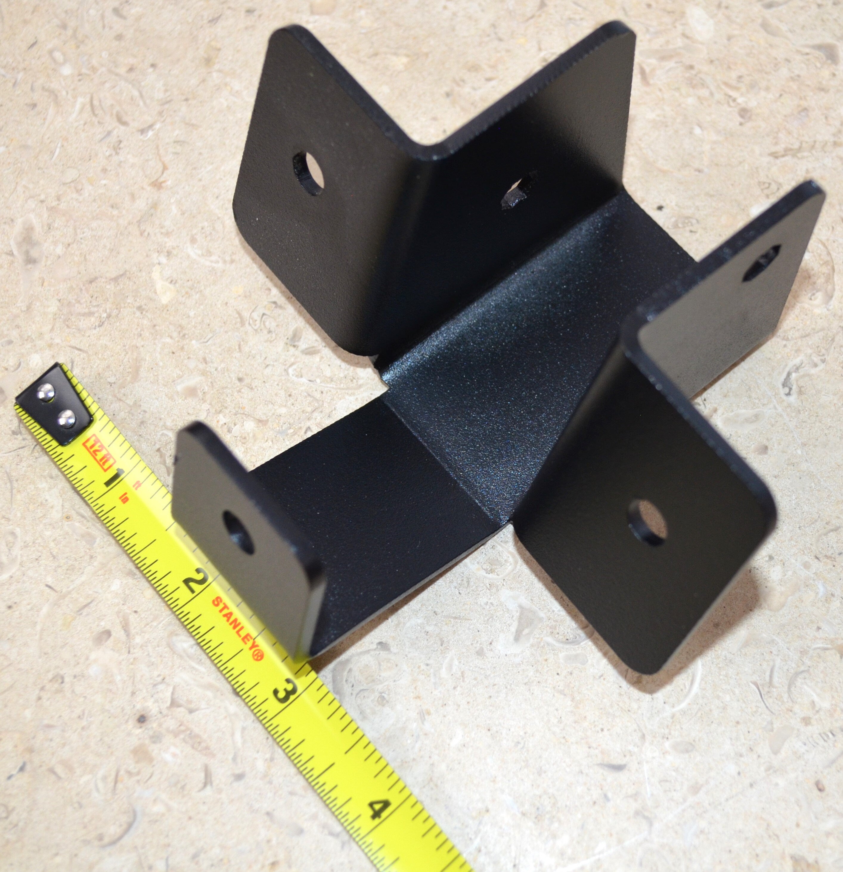 Metal Bracket Designed for Structural Support in Construction Projects and Home Repairs, Showcasing Durability and Versatility